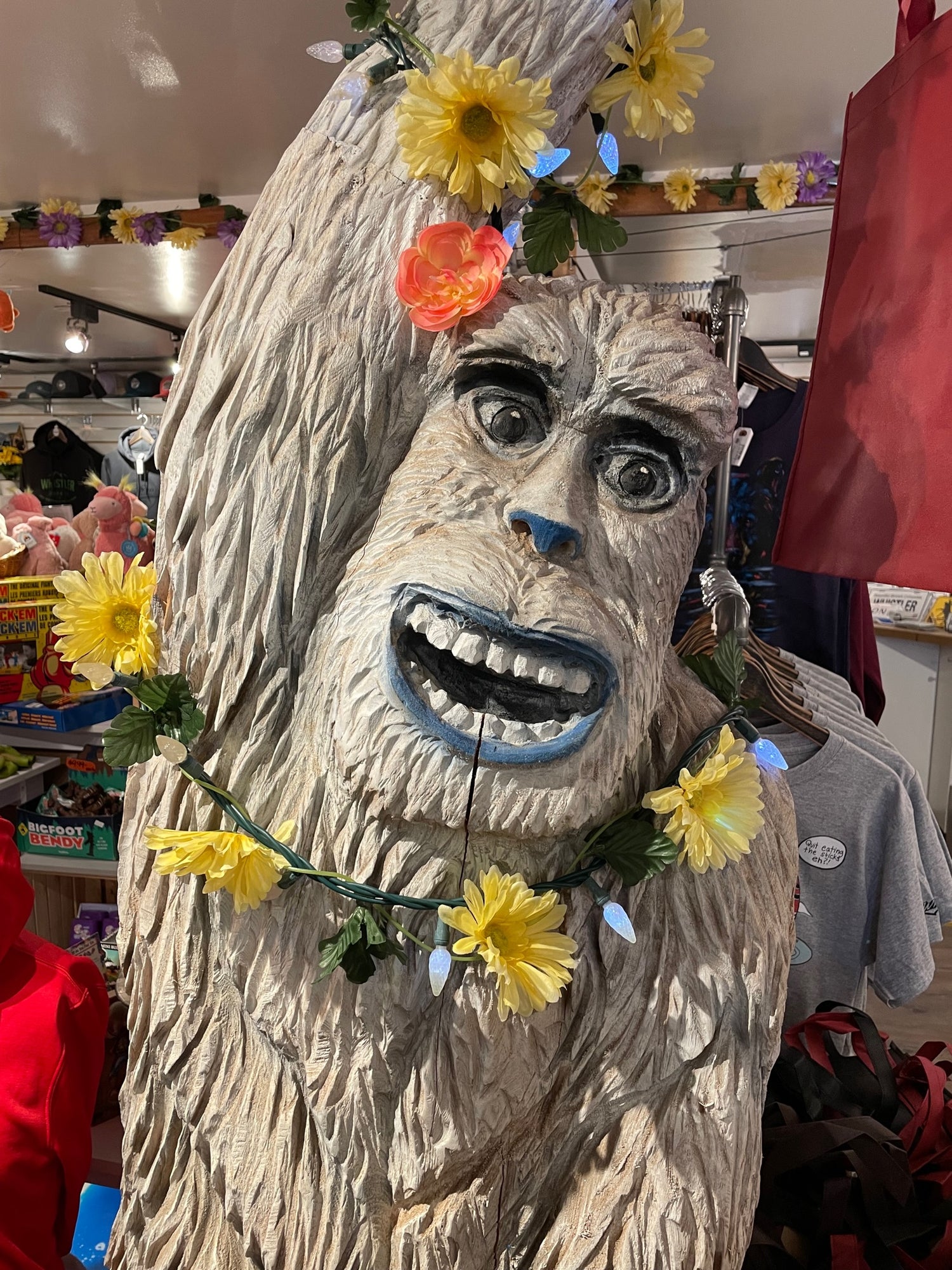 Nooky the yeti mascot in floral garland – Start Here page greeting image