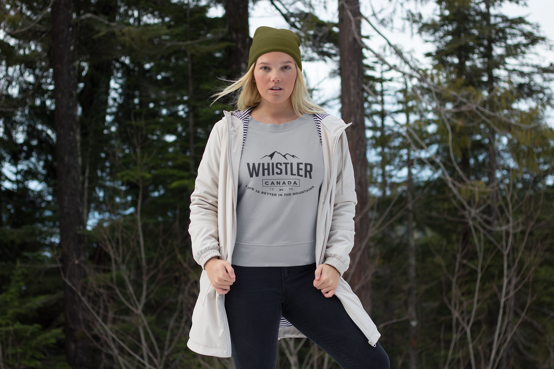 Young woman wearing Classic Whistler logo crewneck sweatshirt